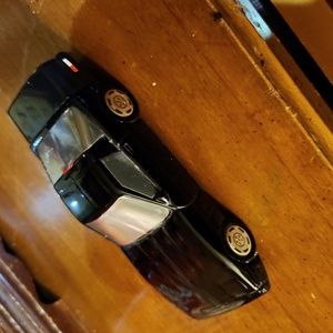 Avon brand Clint aftershave racecar bottle with aftershave inside